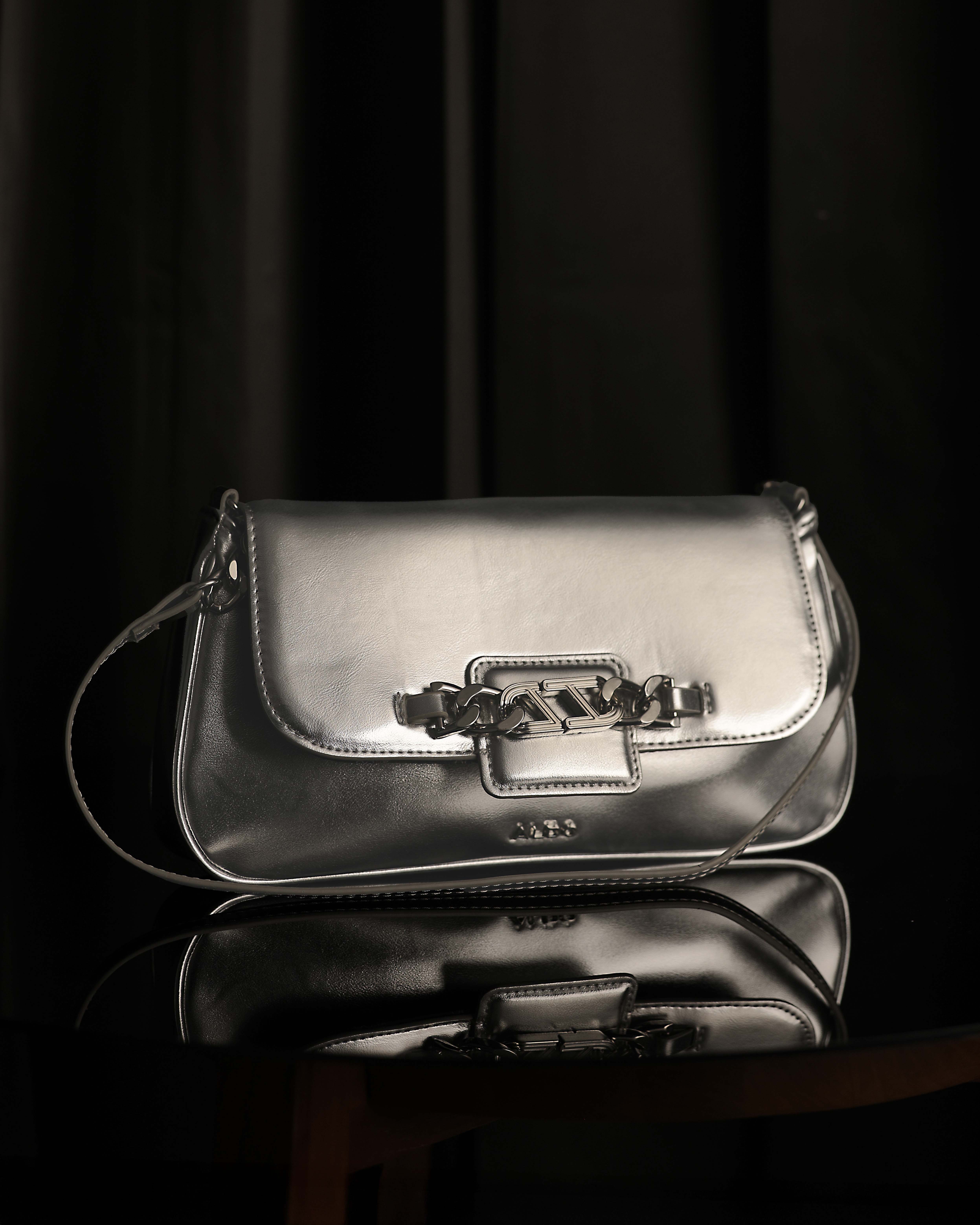Shiny metallic silver handbag