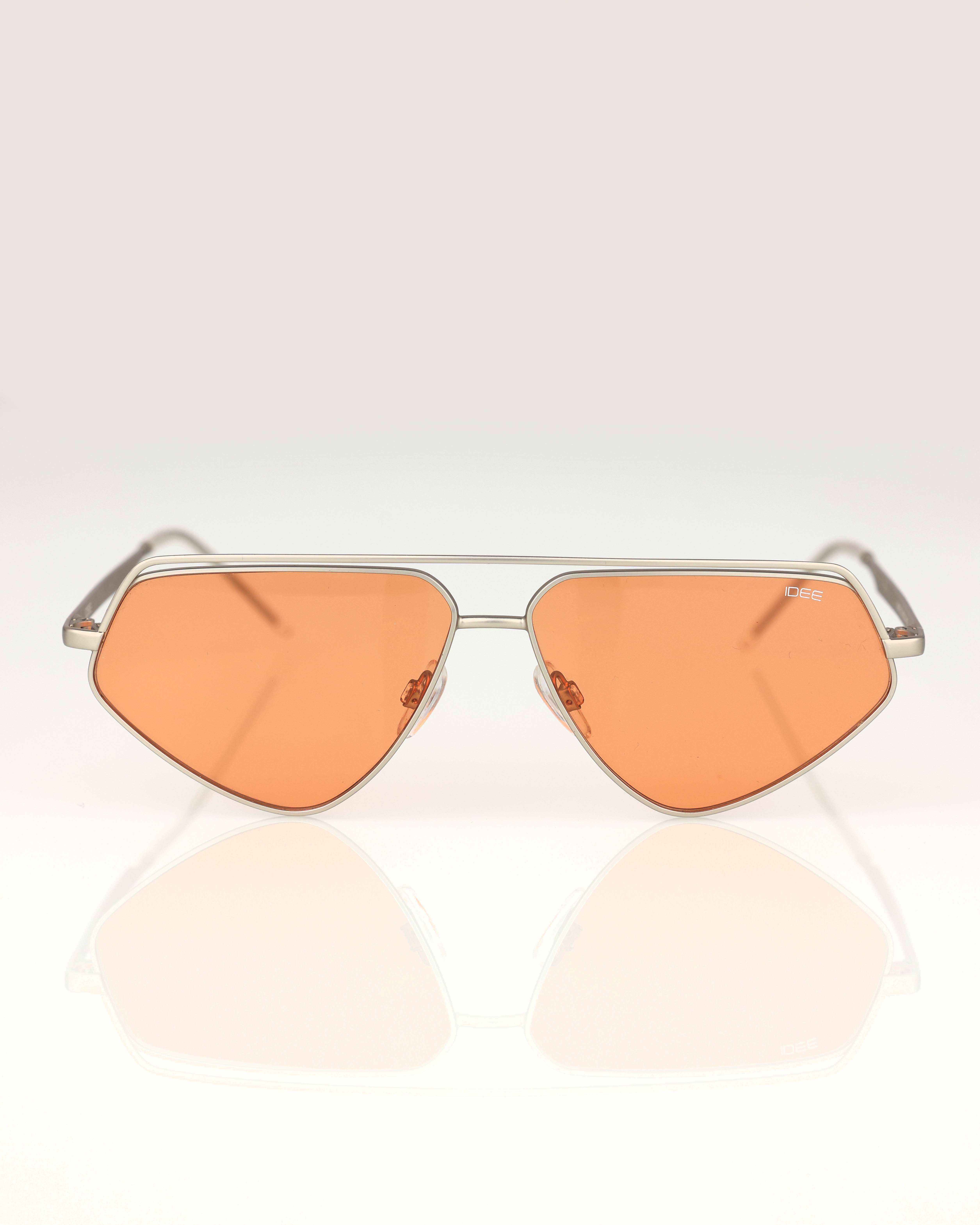 Heart-shaped sunglasses on white background