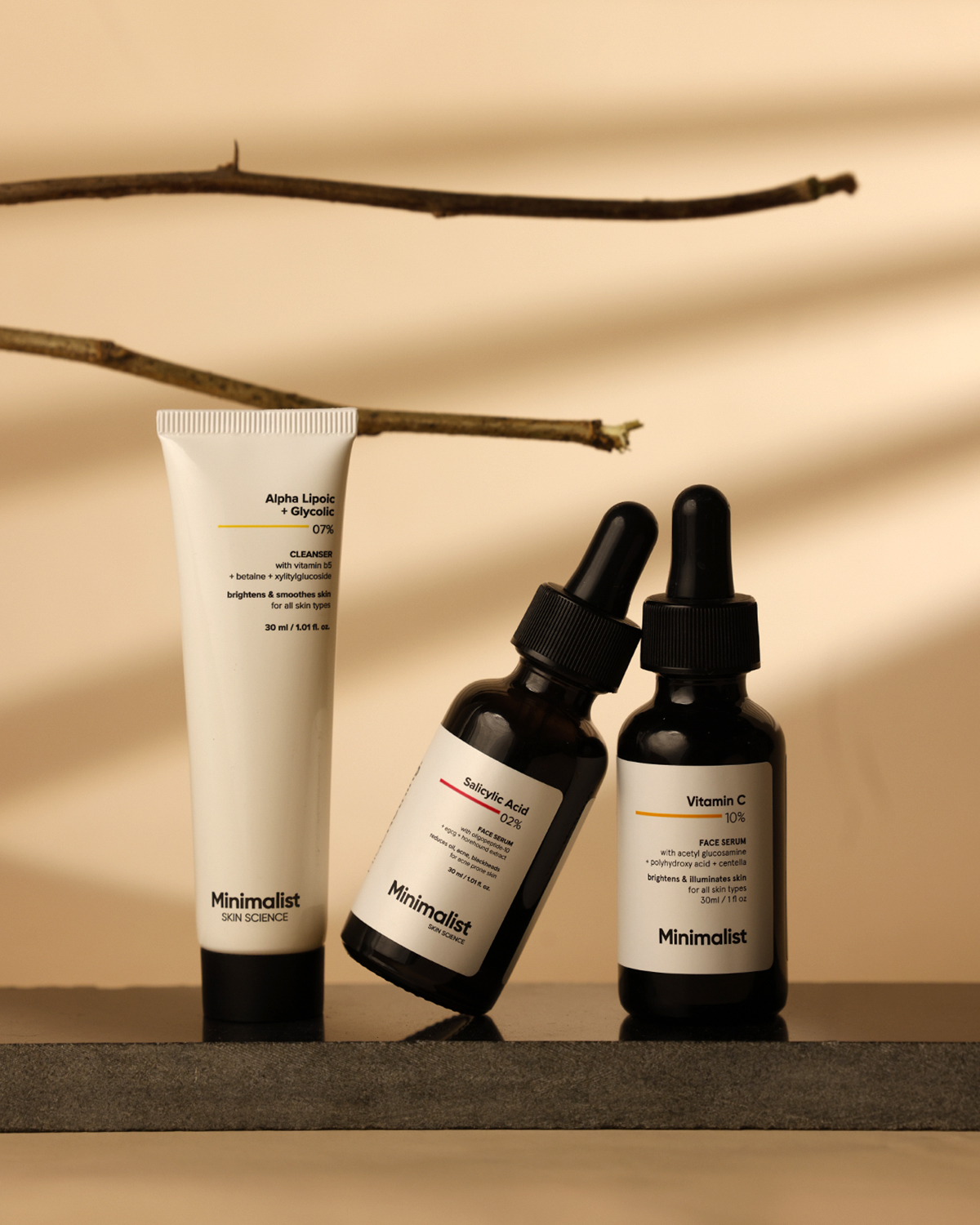 Skincare bottles on white surface